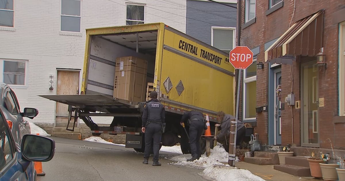 Box truck hits house on narrow Pittsburgh street