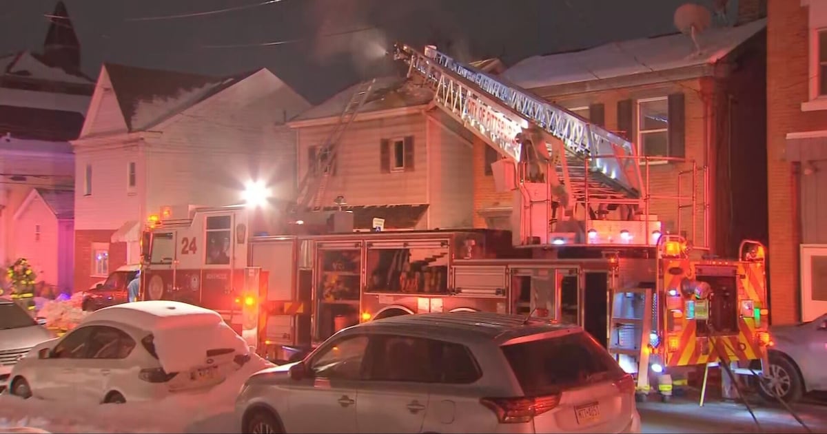 Pittsburgh police officers spot house fire on way to another call, help get resident out – WPXI