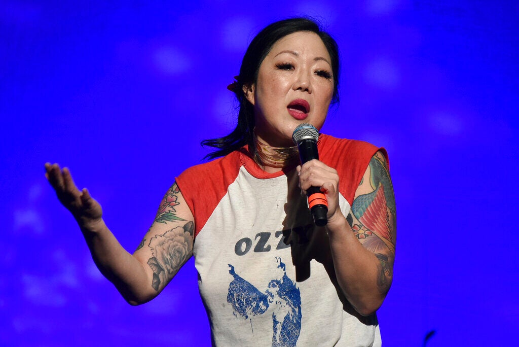 Margaret Cho performs standup comedy on stage