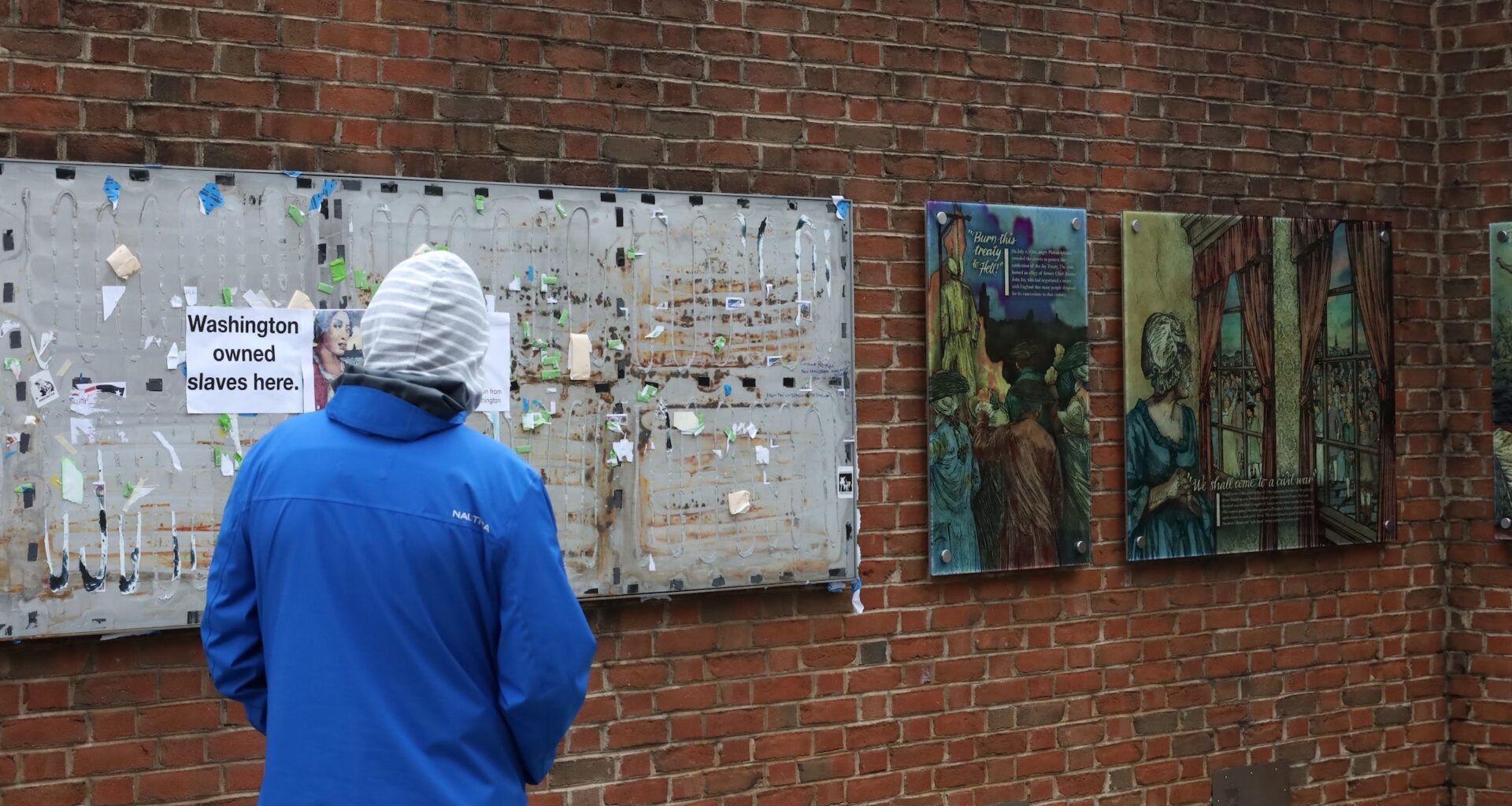 Dozens celebrate restoration of slavery exhibit in Philadelphia