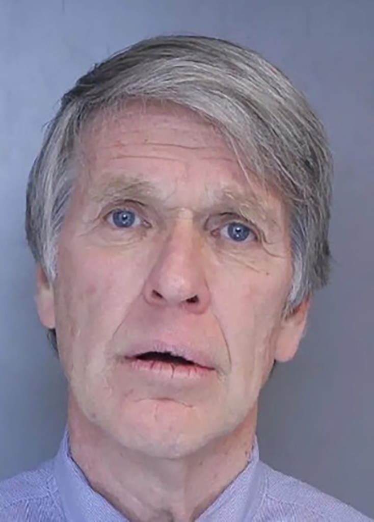 Mugshot of William Stanley, a man with gray hair and blue eyes, wearing a light blue collared shirt.
