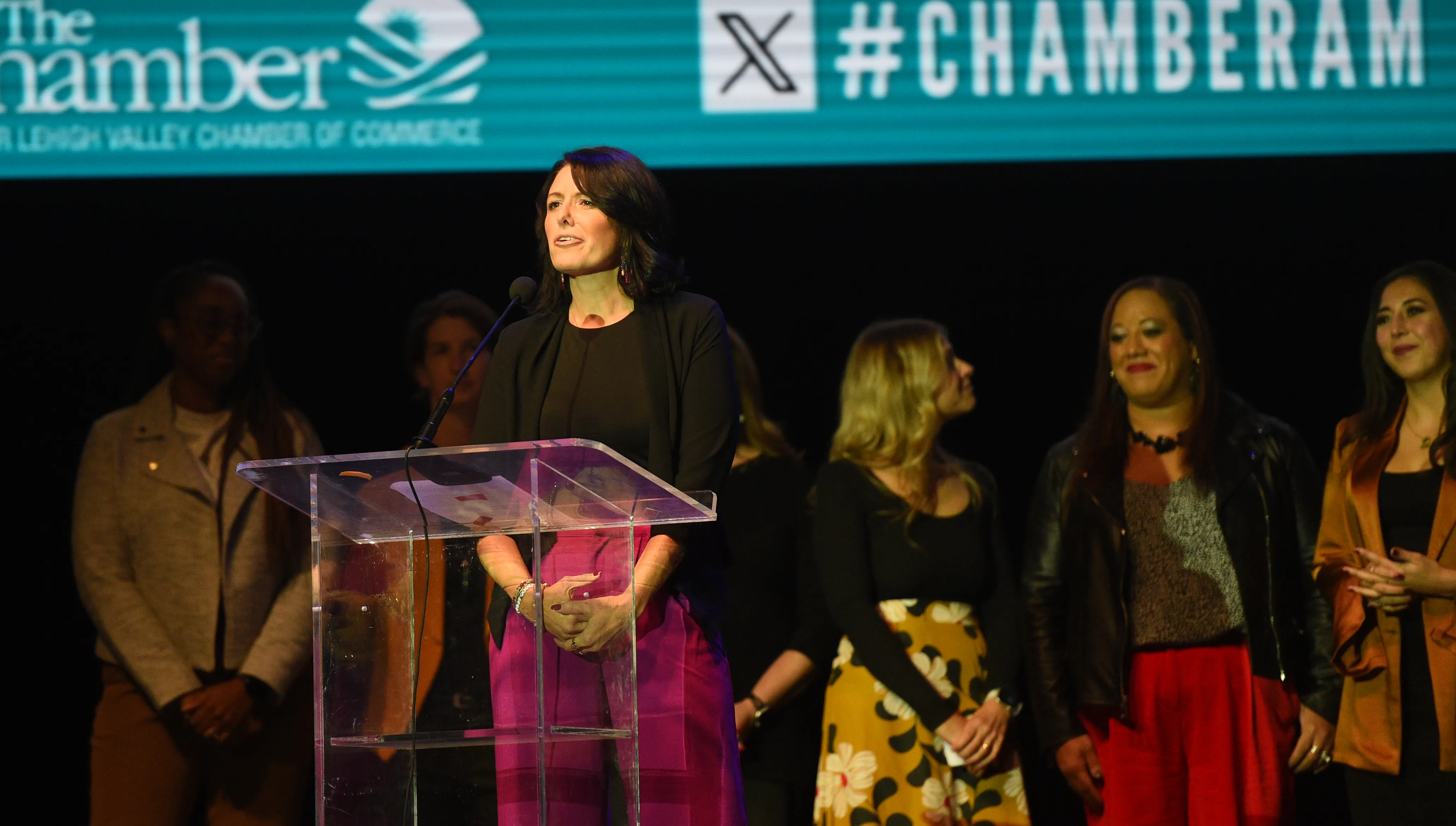 Abby Silfies accepts the Volunteer of the Year Award on...