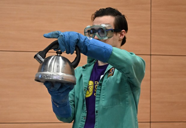 Da Vinci Science Center employee Tom Prostko performs a demonstration featuring liquid nitrogen Saturday, Jan. 4, 2025, during Ice Cream Wars at Da Vinci Science Center in Allentown. The annual event features Lehigh Valley businesses creating unique flavors of ice cream, with attendees casting votes to determine the champion. (Amy Shortell/The Morning Call)