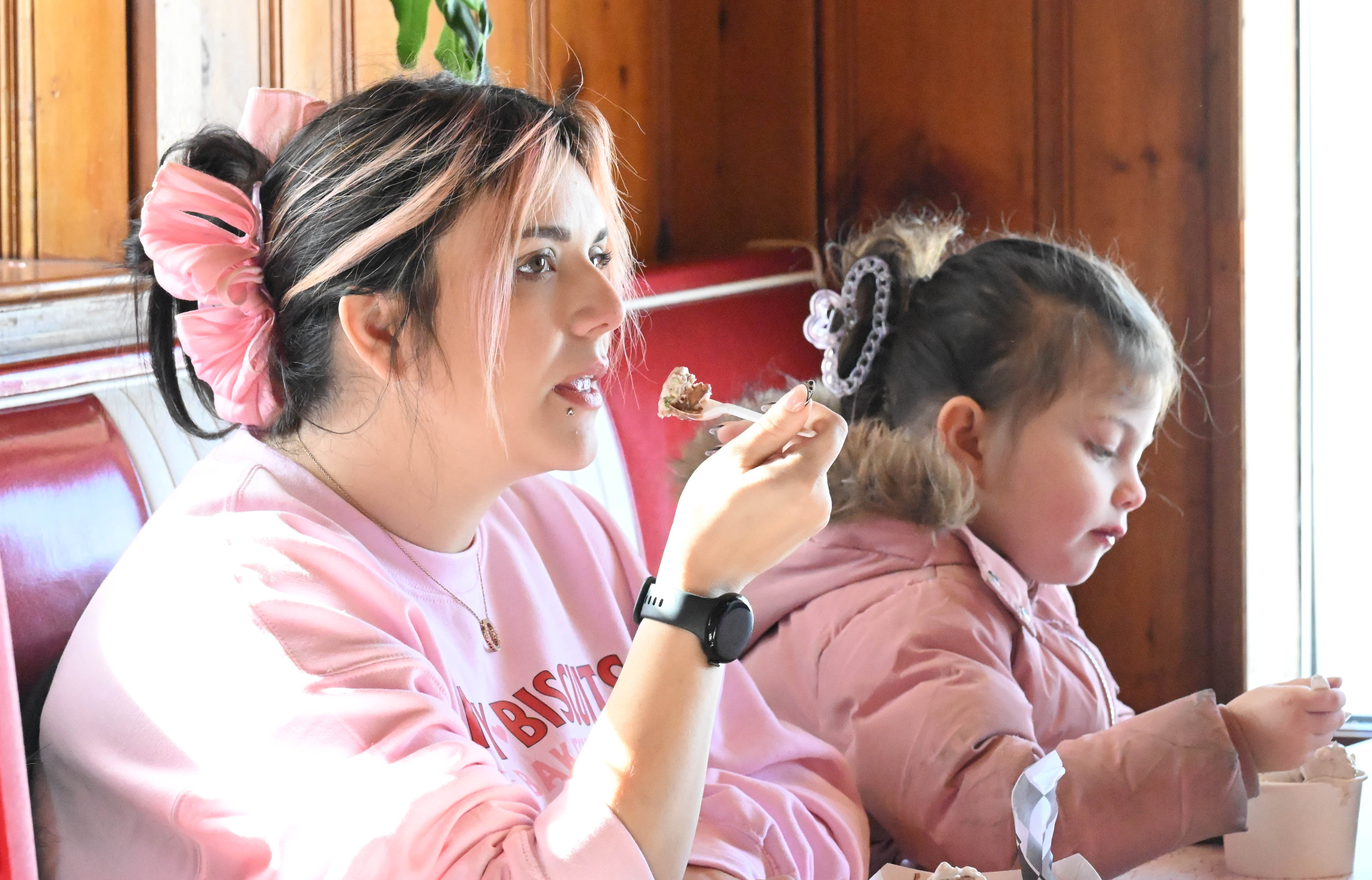 Dylan Garcia creates a waffle sundae Saturday, Feb. 7, 2026,...