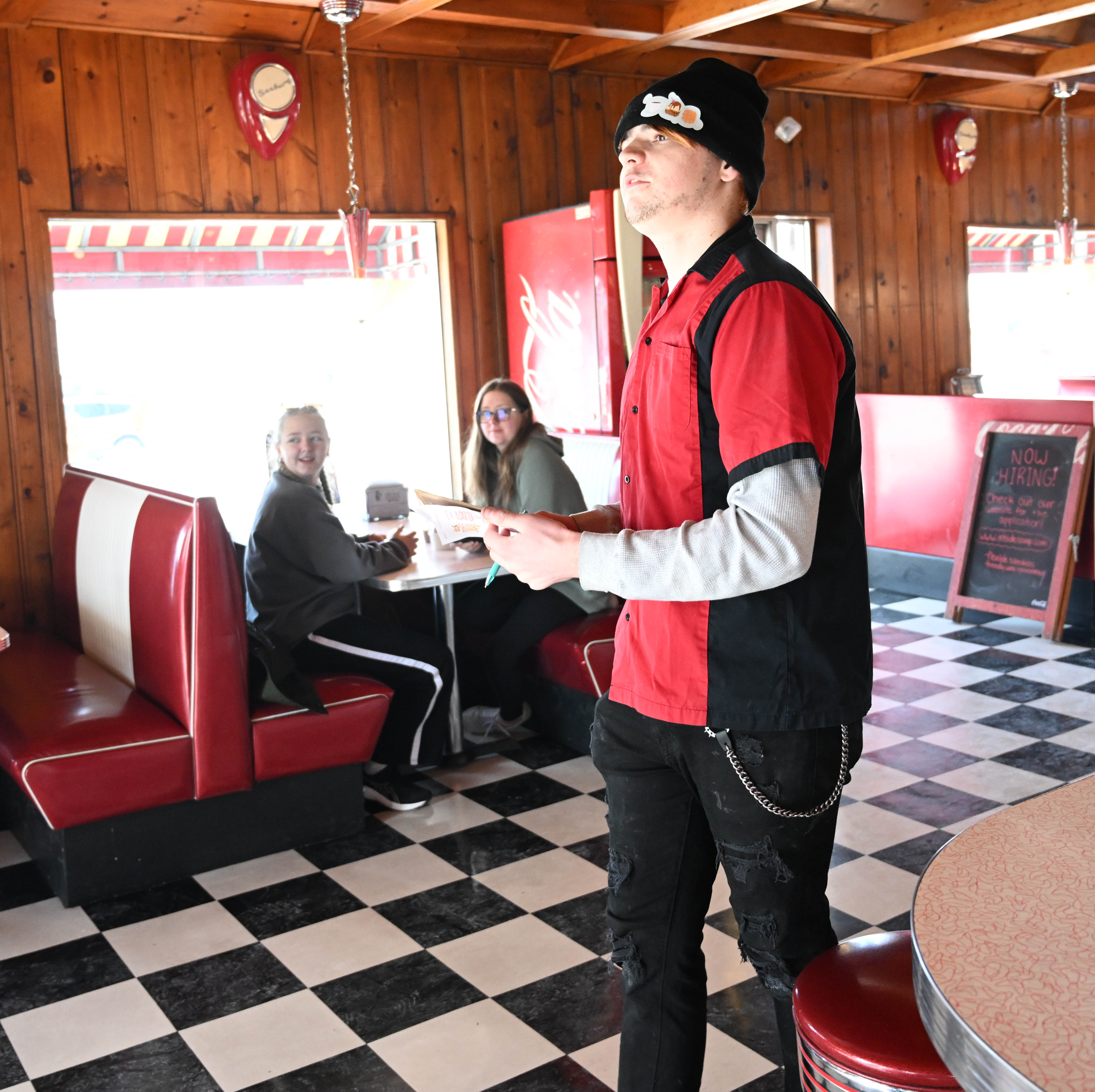 Dylan Garcia greets customers Saturday, Feb. 7, 2026, at Inside...