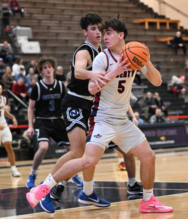 Liberty's Jake Pukszyn drives down the court during a boys basketball game Monday, Feb. 2, 2026, against Nazareth at Liberty High School in Bethlehem. (Amy Shortell/The Morning Call)