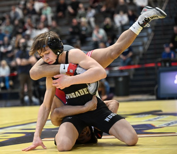 Parkland's Luis Moya wrestles Notre Dame- Green Pond's Max Quarry in the 107 weight bout Saturday, Feb. 28, 2026, during the Northeast Regional Class 3A wrestling championship matches at Liberty High School in Bethlehem. (Amy Shortell / The Morning Call)