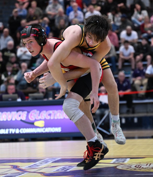 Easton's Nick Salamone wrestles Emmaus' Emilio Albanese in the 127 weight bout Saturday, Feb. 28, 2026, during the Northeast Regional Class 3A wrestling championship matches at Liberty High School in Bethlehem. (Amy Shortell / The Morning Call)