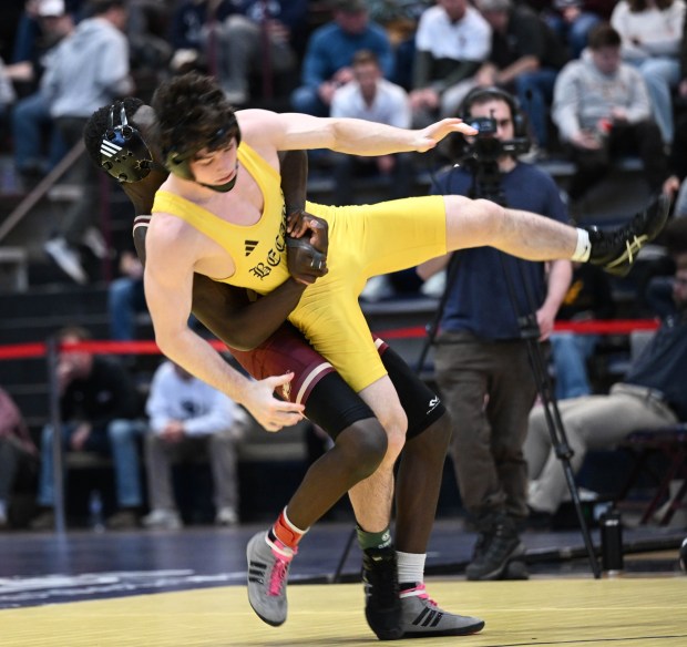 Whitehall's Wilmont Kai wrestles Bethlehem Catholic's Keanu Dillard in the 133 weight bout Saturday, Feb. 28, 2026, during the Northeast Regional Class 3A wrestling championship matches at Liberty High School in Bethlehem. (Amy Shortell / The Morning Call)