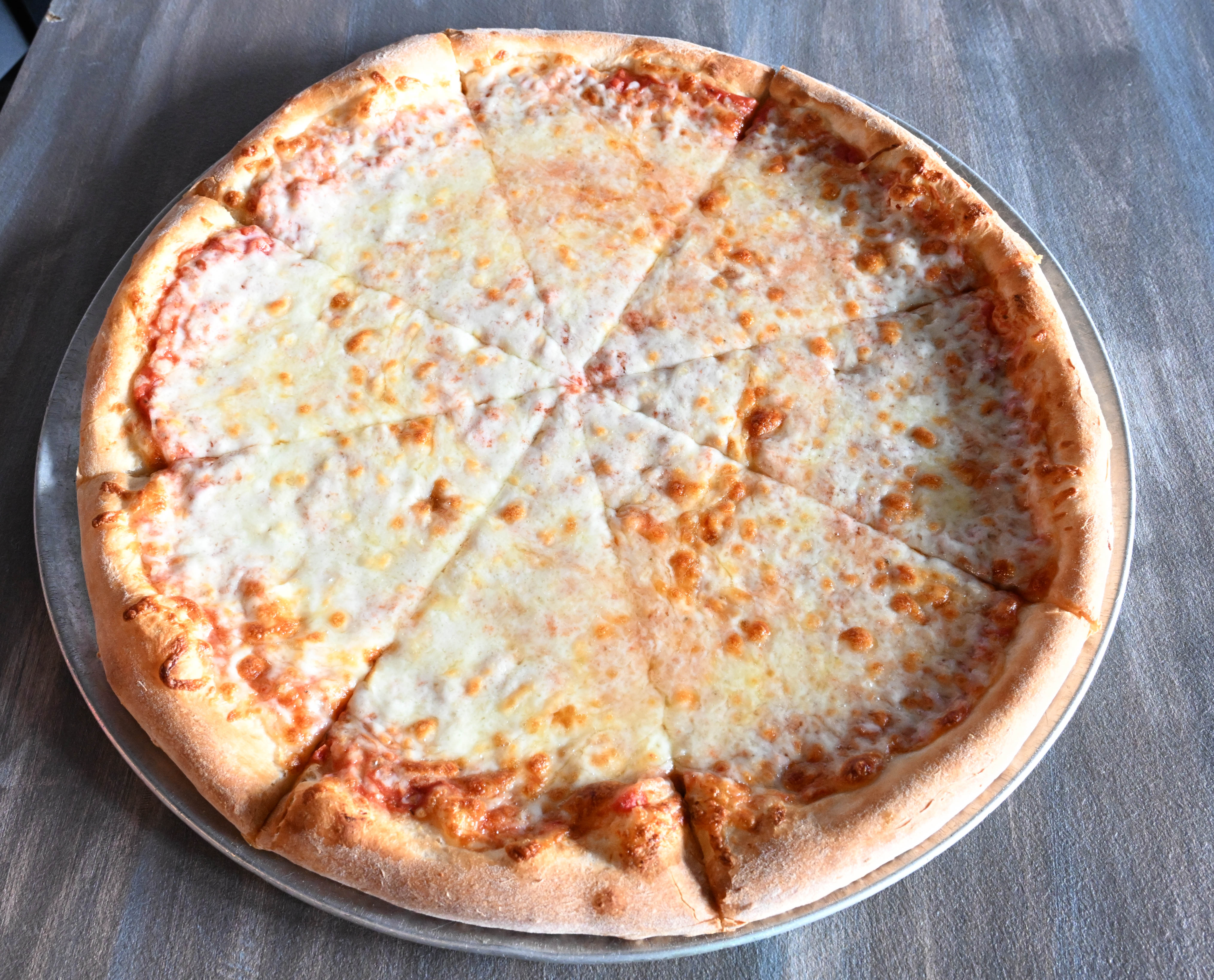 A cheese pizza is seen Thursday, Jan. 29, 2026, at...