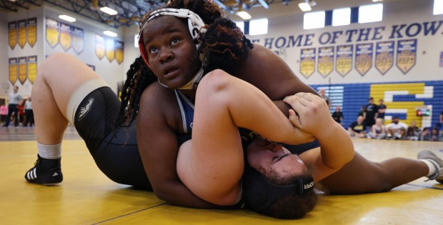 Semifinal match between Freedom's Mekialla Mauvais, Top, vs Davenport's Chloe Villanueva, on Friday, February 20, 2026. Mauvais won the 235lbs match. (Ricardo Ramirez Buxeda/ Orlando Sentinel)