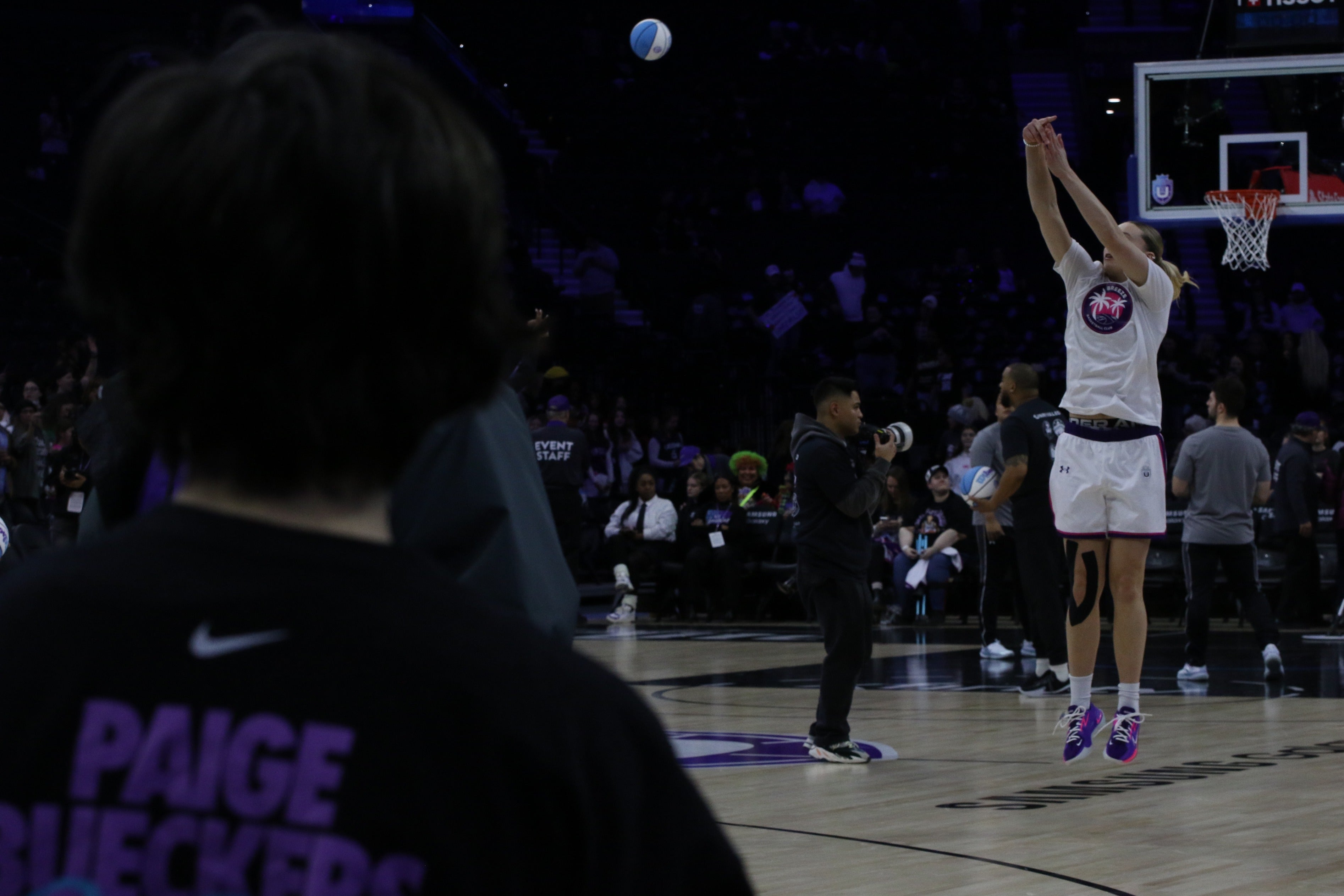 Kristina Posne shooting a jumpshot