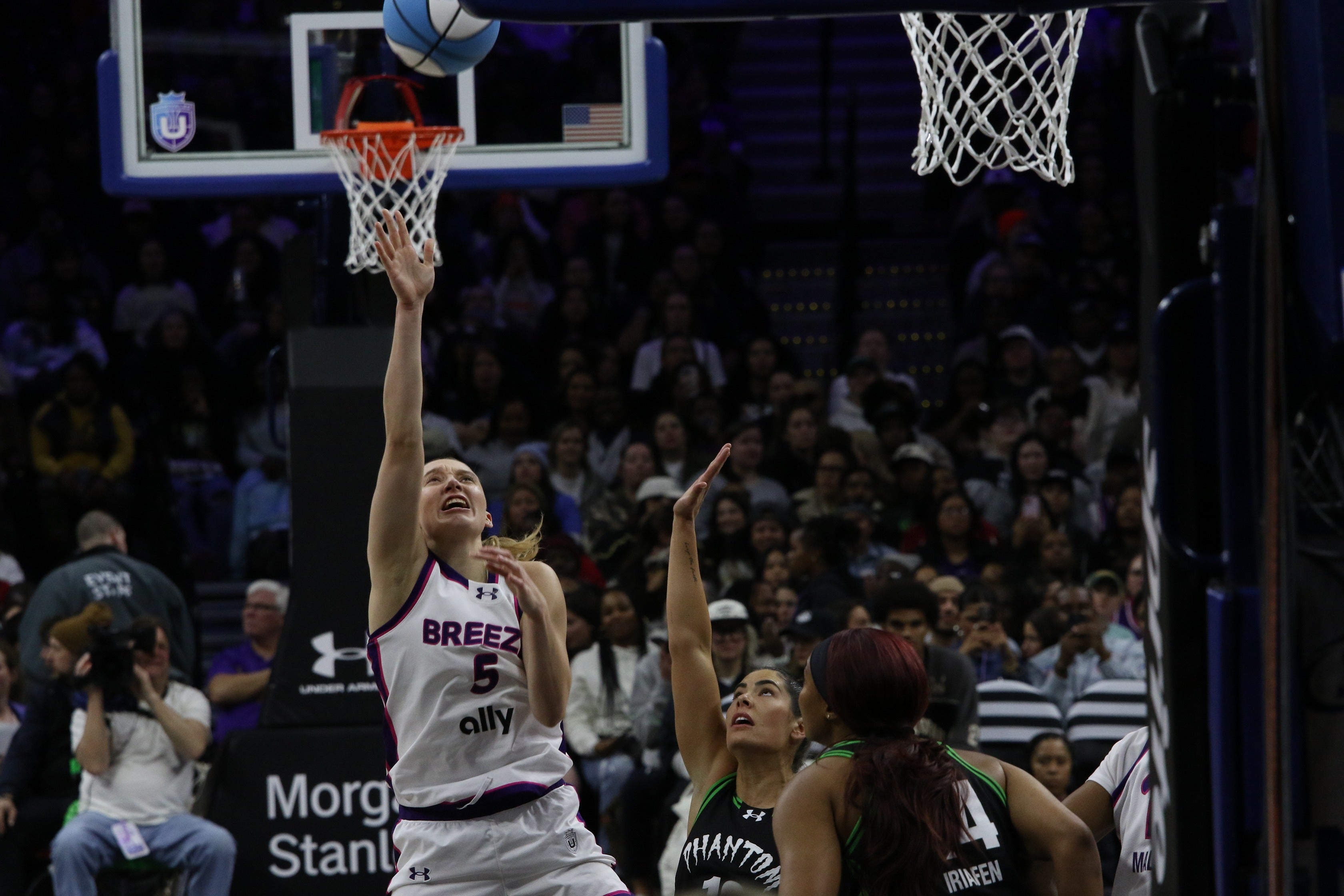 Paige Bueckers attempting a layup