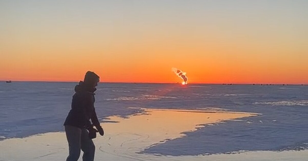 Meet the woman snowmobiling, ice skating, and cooking out on Lake Erie
