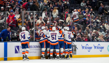 Feb 28, 2026; Columbus, Ohio, USA;  New York Islanders right wing Simon Holmstrom (10) celebrates with teammates after scoring the game-winning goal against the Columbus Blue Jackets in the overtime period at Nationwide Arena. Mandatory Credit: Aaron Doster-Imagn Images