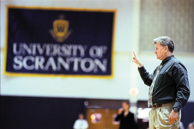 Lady Royals coach Mike Strong gives instructions to his team during a sectional win over New York University in 1999. (TIMES-TRIBUNE FILE)Byline: Butch Comegys Date created: 03/15/99