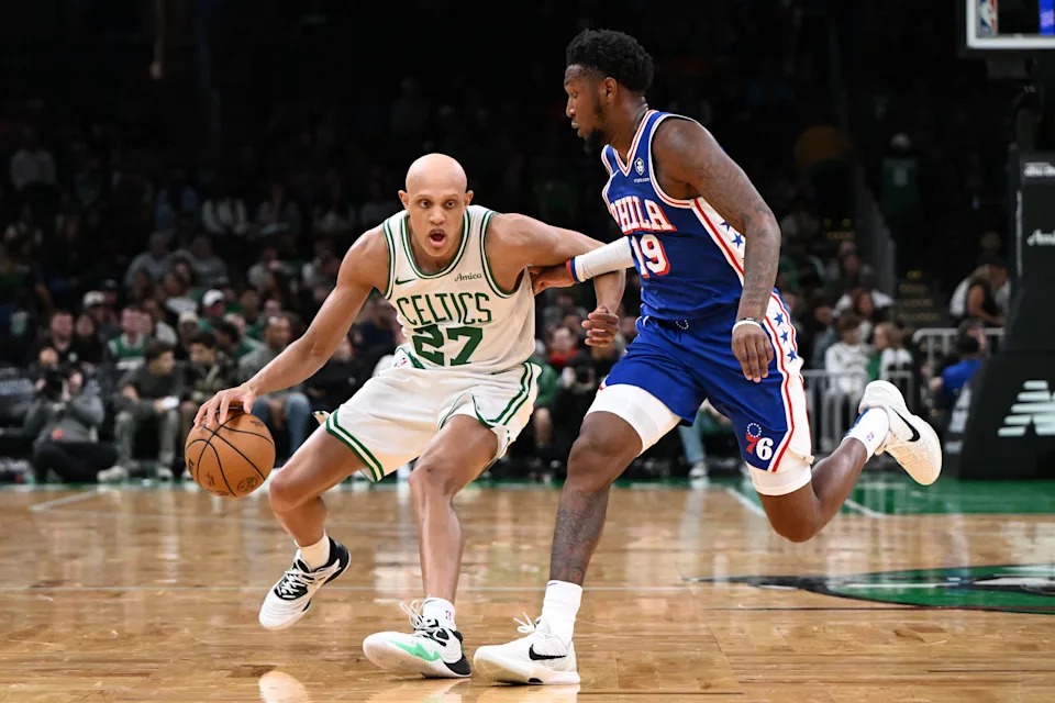 Oct 12, 2024; Boston, Massachusetts, USA; Boston Celtics guard Jordan Walsh (27) drives to the basket against Philadelphia 76ers forward Justin Edwards (19) during the second half at the TD Garden. Mandatory Credit: Brian Fluharty-Imagn Images