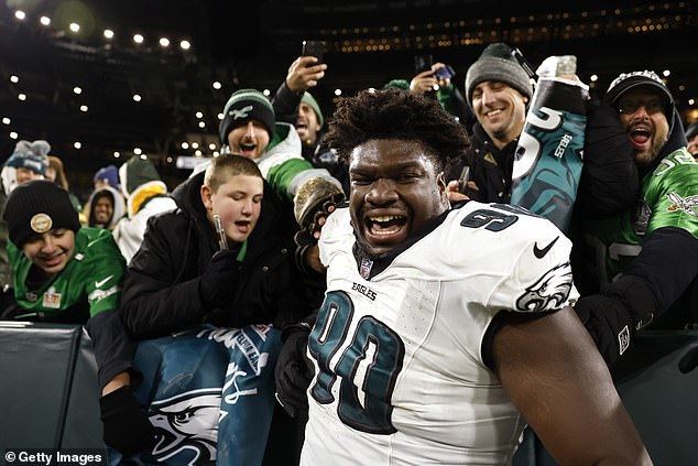 Jordan Davis celebrates with Philadelphia Eagles fans after beating the Packers in November