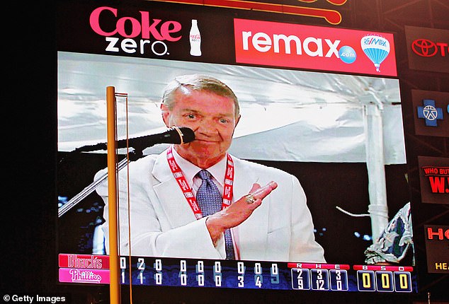 The Late Broadcaster Harry Kalas of the Philadelphia Phillies video is shown on the scoreboard as he sings High Hopes following a 9-2 win against the Arizona Diamondbacks in 2011