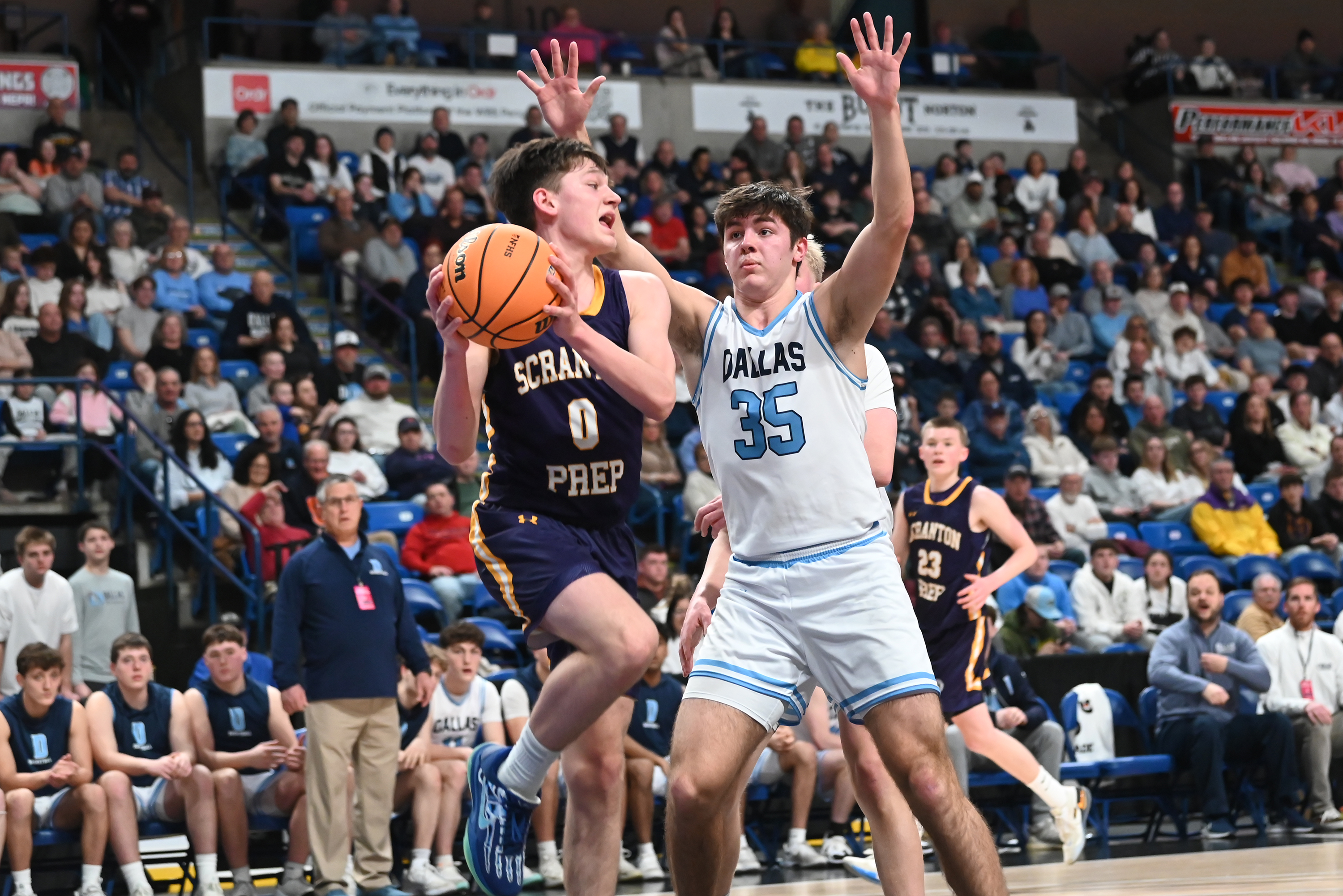 Dallas’ Talan Geskey defends Scranton Prep’s Chicky Skoff during the...