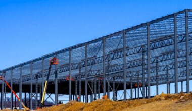 Construction continues on an industrial building photos
