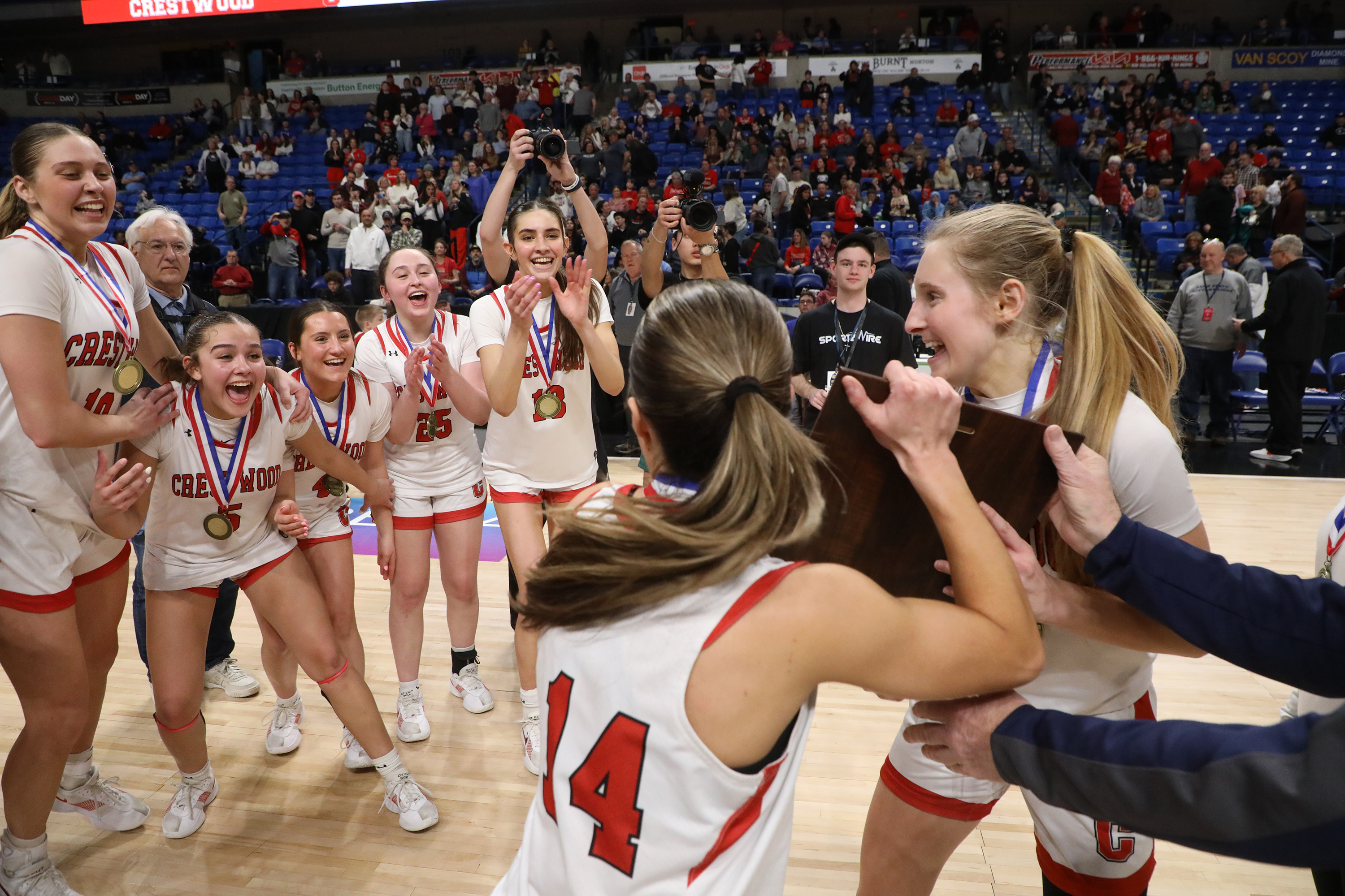 Crestwood’s Jordan Andrews and Keira Dougherty during present their teammates...