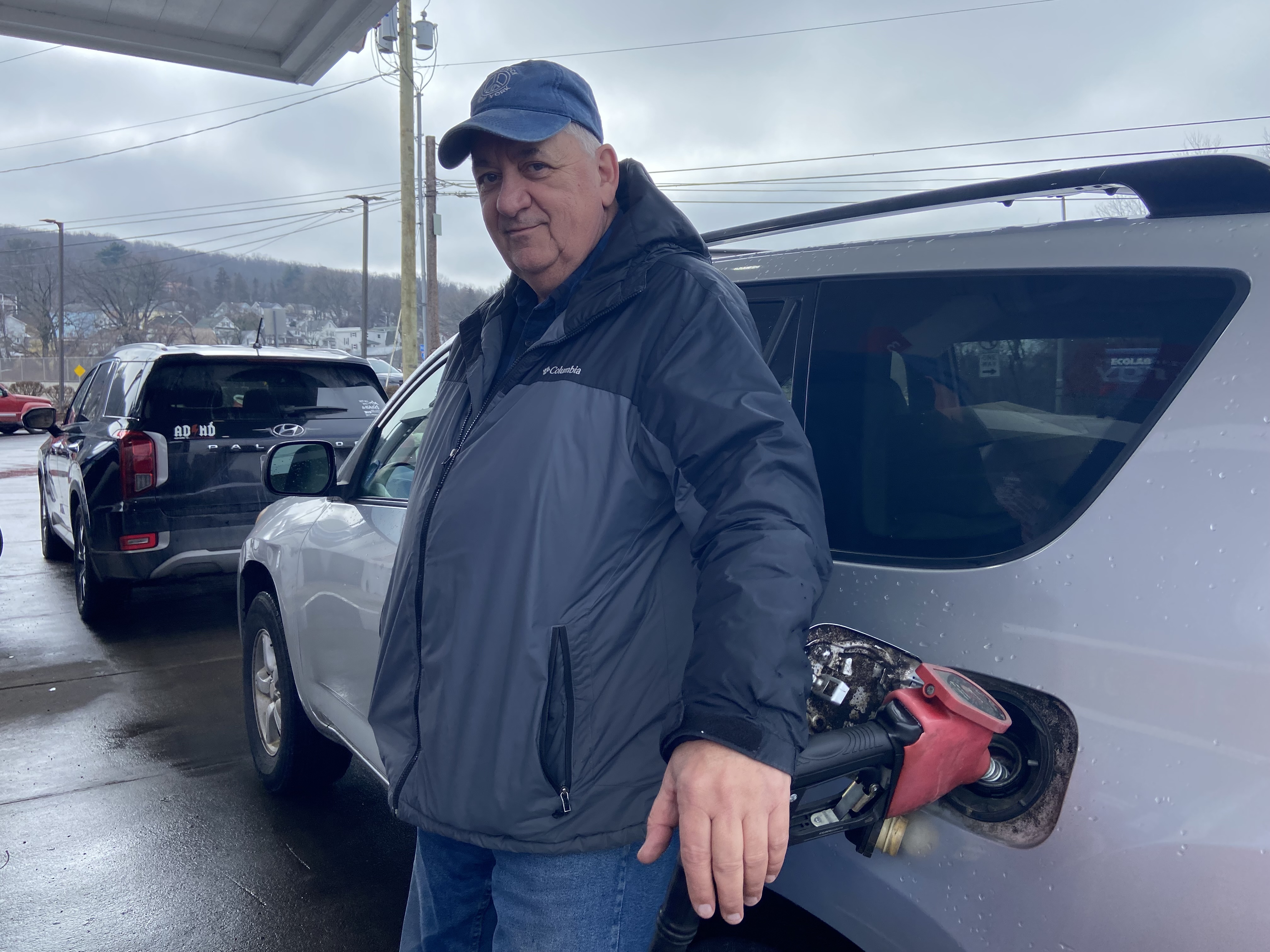 Dan Reynolds of Scranton pumps gas at the Exxon gas...