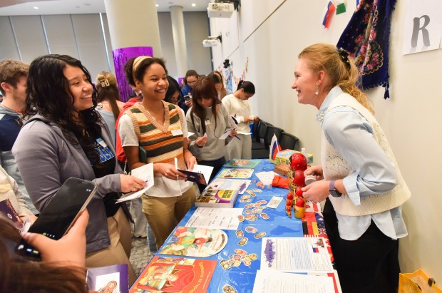 University of Scranton Russian Language teacher Anastasia Maume, right, talks with West Scranton students Emily Lopez and Elle Brewster during World Languages Day in the school's Leahy Hall Thursday , March 5, 2026. (SEAN MCKEAG / STAFF PHOTOGRAPHER)