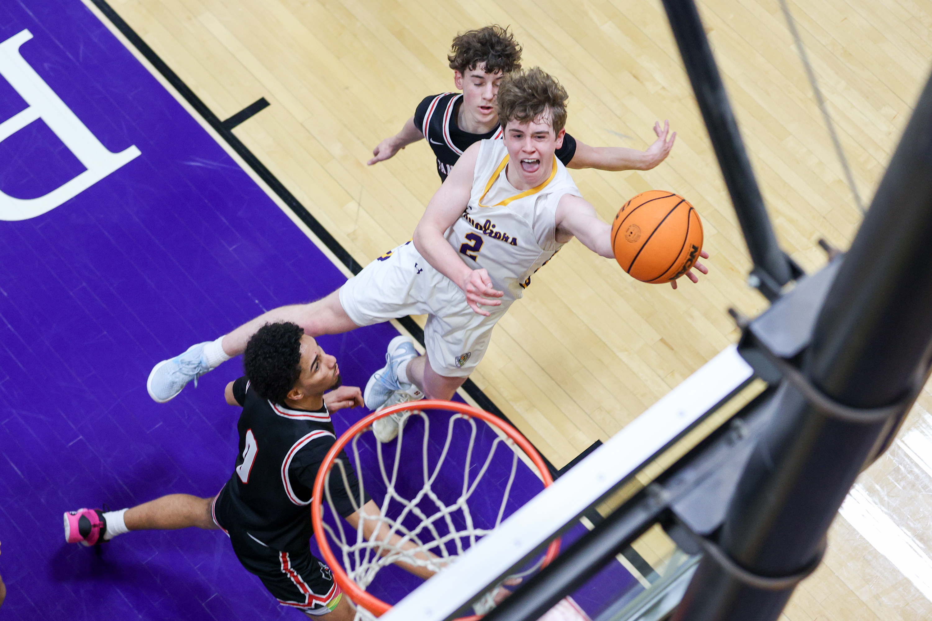 Scranton Prep’s Brody Martin (2) takes an off-balanced shot during...