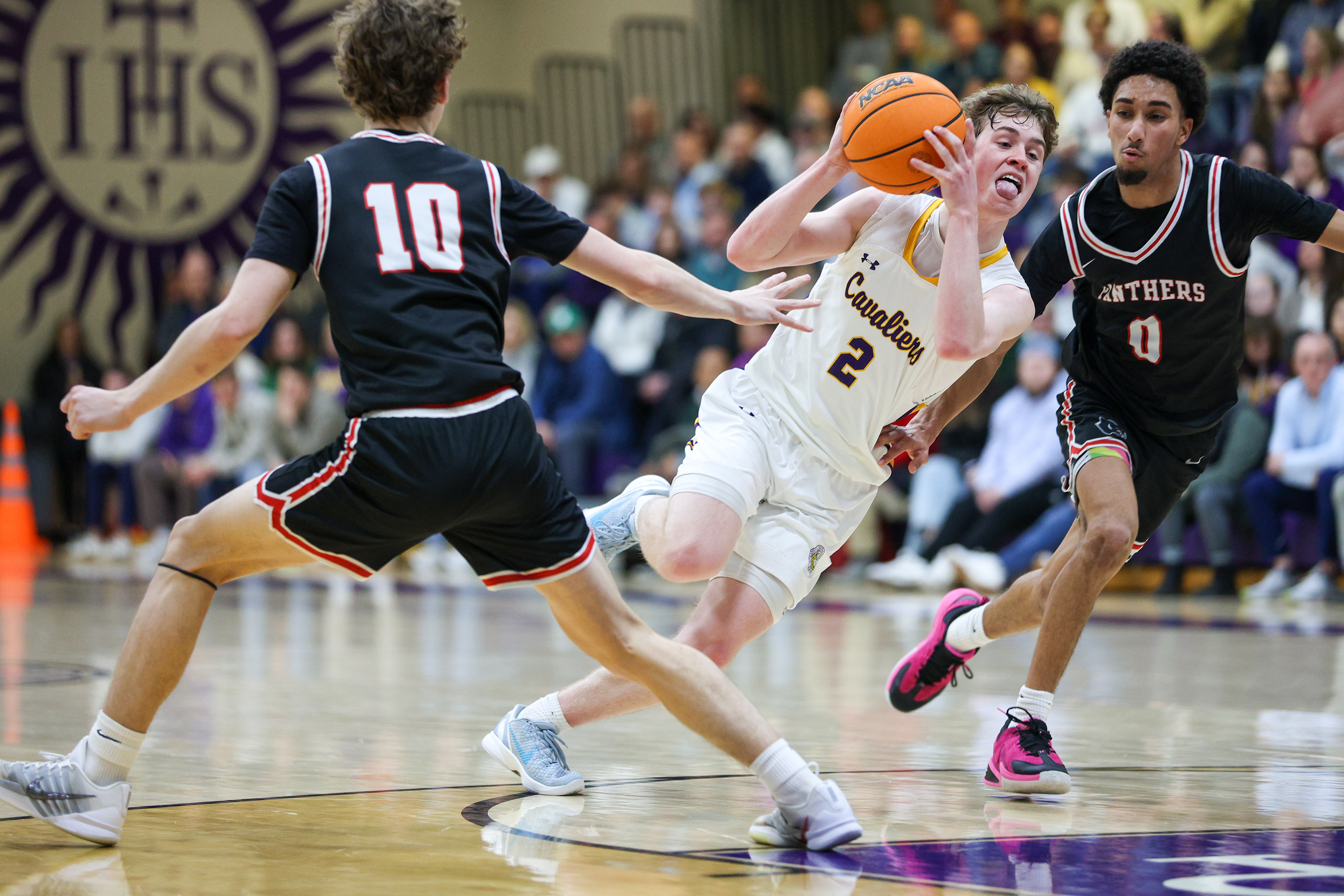 Scranton Prep’s Brody Martin (2) weaves through defenders during the...
