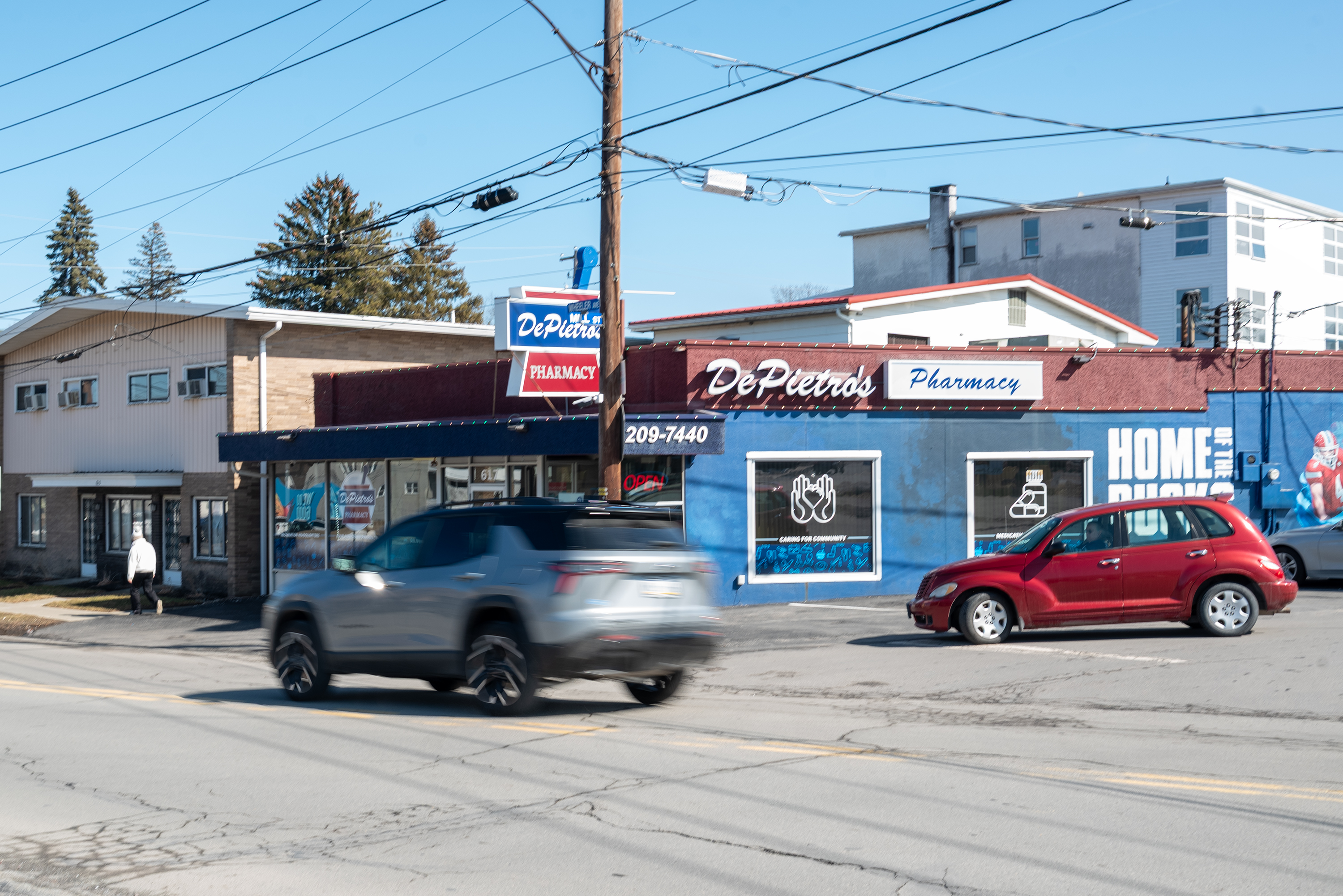Vehicles travel past DePietro’s Pharmacy in Dunmore on Wednesday, March...