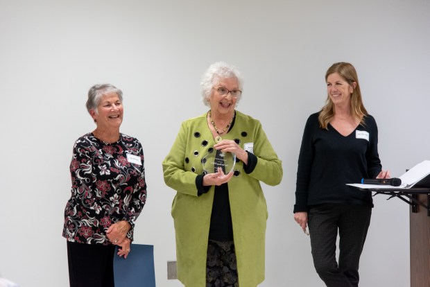 Judy Ellsworth and Sherry Davis of Berks Book Bonanza accept the Berks County Public Libraries' Dreisbach Award for Exemplary Service from Advisory Board member Mary Ellen Wells. (Courtesy of Berks County Public Libraries)