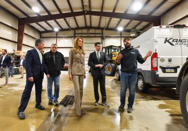 Administrator for the U.S. Small Business Administration Kelly Loeffler, center, U.S. Rep. Dan Meuser, far left, U.S. Rob Bresnahan, second from right, get a tour of Kriger Pipeline in Dickson City by Kriger Pipeline Owner and President Butch Kriger and son Joel Kriger Thursday, March 12, 2026. (SEAN MCKEAG / STAFF PHOTOGRAPHER)