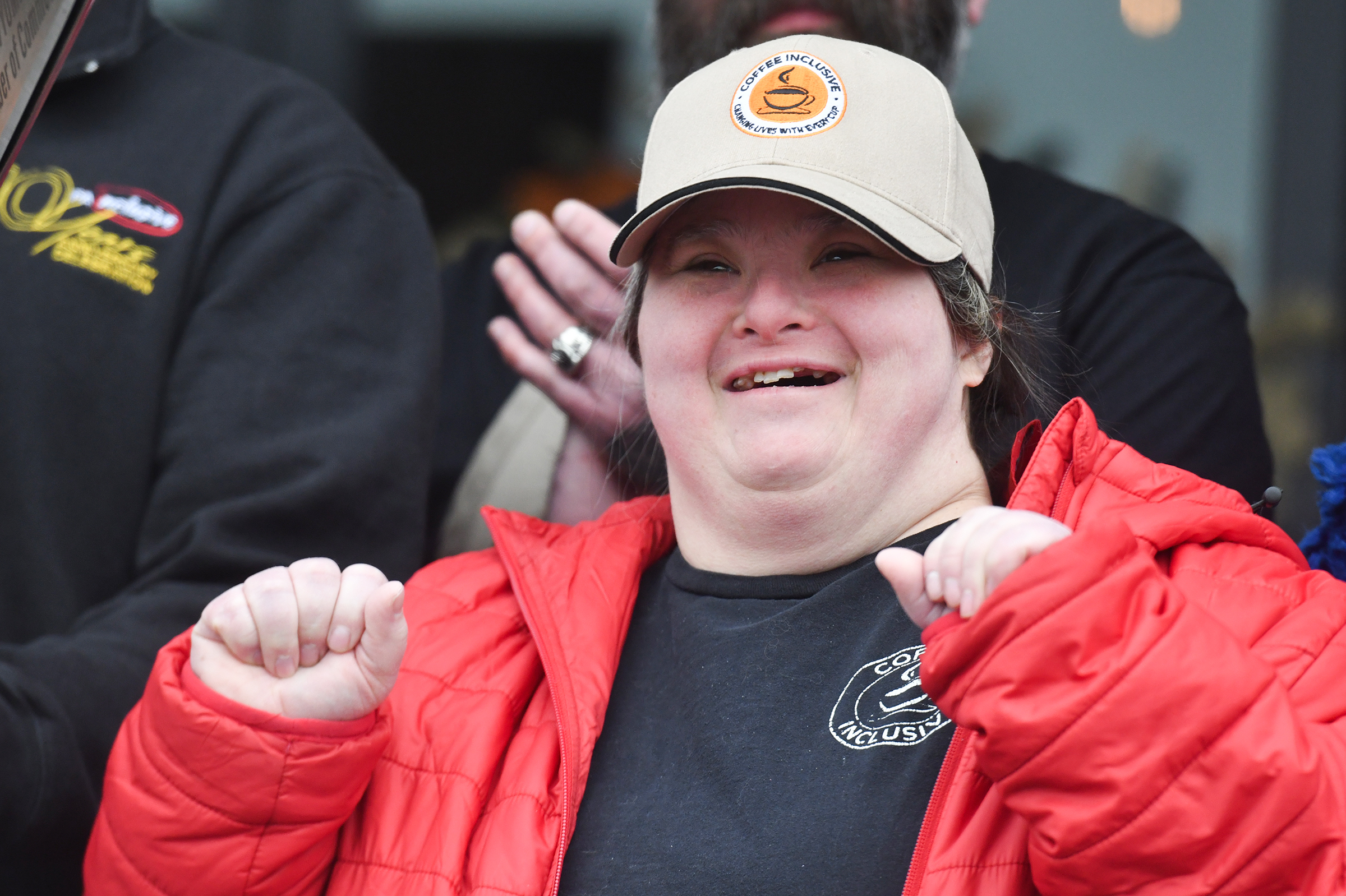 Employee Selena Waters celebrates during the event at Coffee Inclusive...