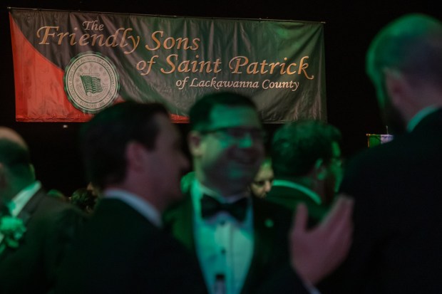Attendees to the Friendly Sons of St. Patrick dinner mingle before the event at the Scranton Cultural Center in Scranton on Friday, March 13, 2026. (REBECCA PARTICKA/STAFF PHOTOGRAPHER)