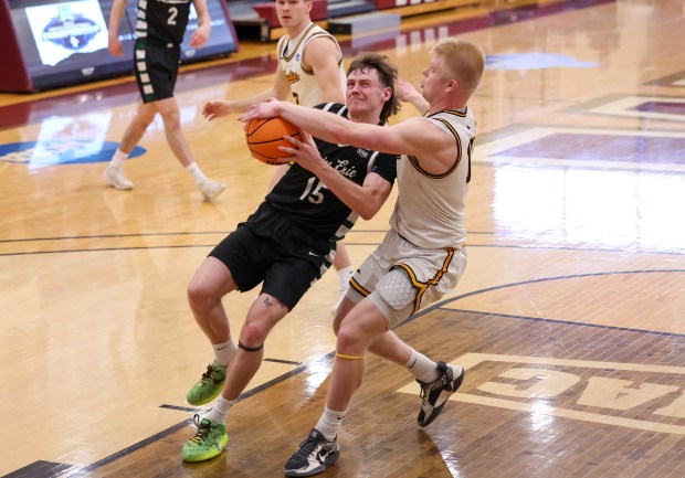 Lake Erie College's Kai Bloom goes up for a shot against Michigan Tech March 14 in North Canton. (Tim Phillis - For The News-Herald)