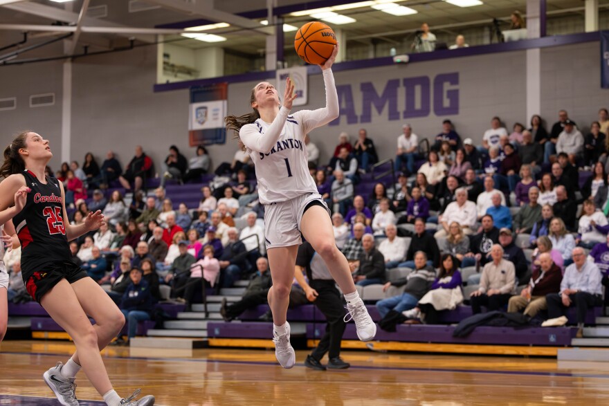 The University of Scranton's Kaeli Romanowski goes up for a layup in the Landmark Conference semifinals.