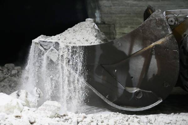 The salt, formed 440 million years ago, is mucked up and loaded onto a conveyor belt 1,800 feet below the surface of Lake Erie, in Cleveland, Ohio, Thursday, March 19, 2026. (AP Photo/Sue Ogrocki)