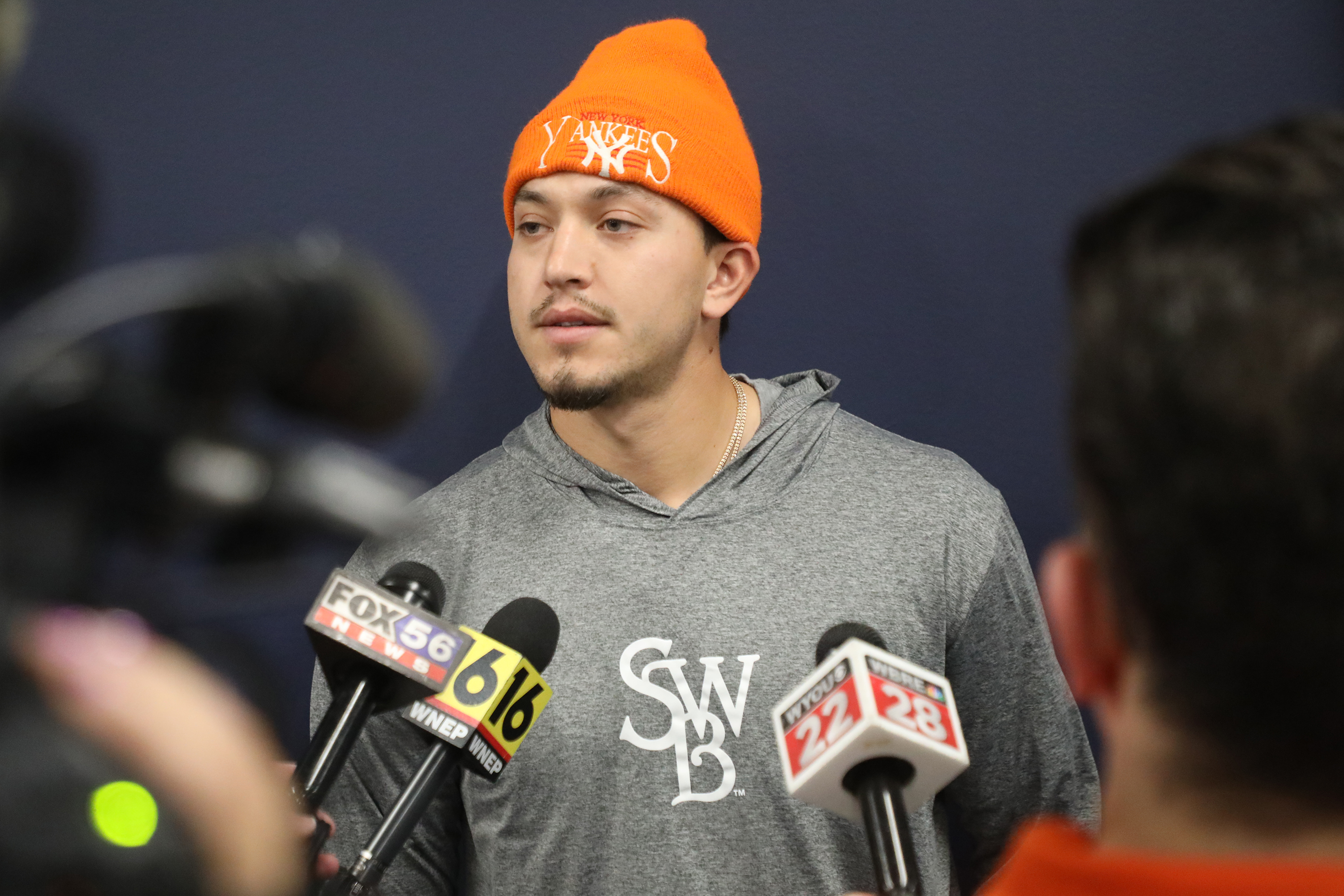 Pitcher Dom Hamel speaks to the press during the RailRiders’...