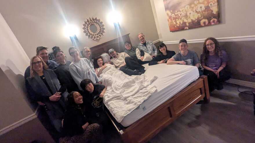 The Lantz extended family surround Harvey Allen and his parents Catlin and Eric Lantz just after he was born at The Midwife Center in Pittsburgh.