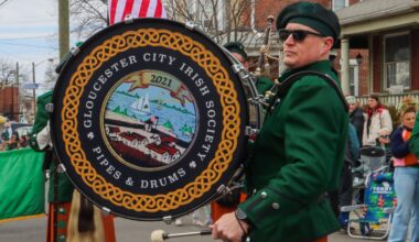 Sounds of bagpipes and drums ring through Gloucester City during annual parade