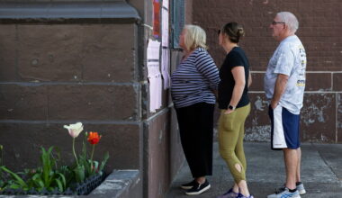 Voters view a sample ballot on Pennsylvania