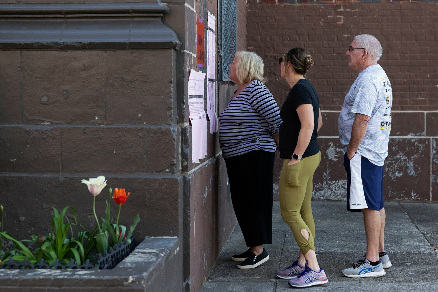 Voters view a sample ballot on Pennsylvania