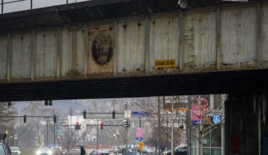 Railroad trestles at Pittsburgh's Strip District entrance will be painted black and gold for NFL Draft