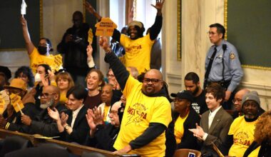 Supporters of the Safe Healthy Homes Act legislation cheer after it was voted out of a City Council committee Wednesday, March 4, 2026.