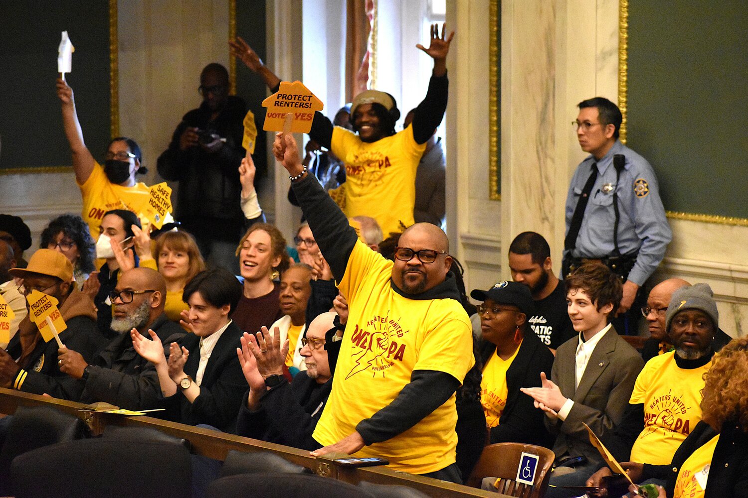 Supporters of the Safe Healthy Homes Act legislation cheer after it was voted out of a City Council committee Wednesday, March 4, 2026.