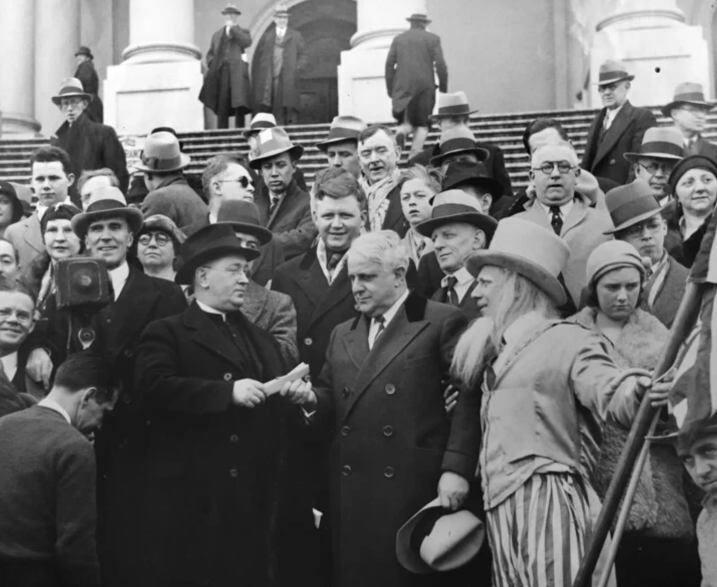 Father James Cox (front left), an advocate for the poor and unemployed in Pittsburgh, leads a 25,000 person demonstration in Washington, D.C., in 1932, demanding Congress provide unemployment relief. 