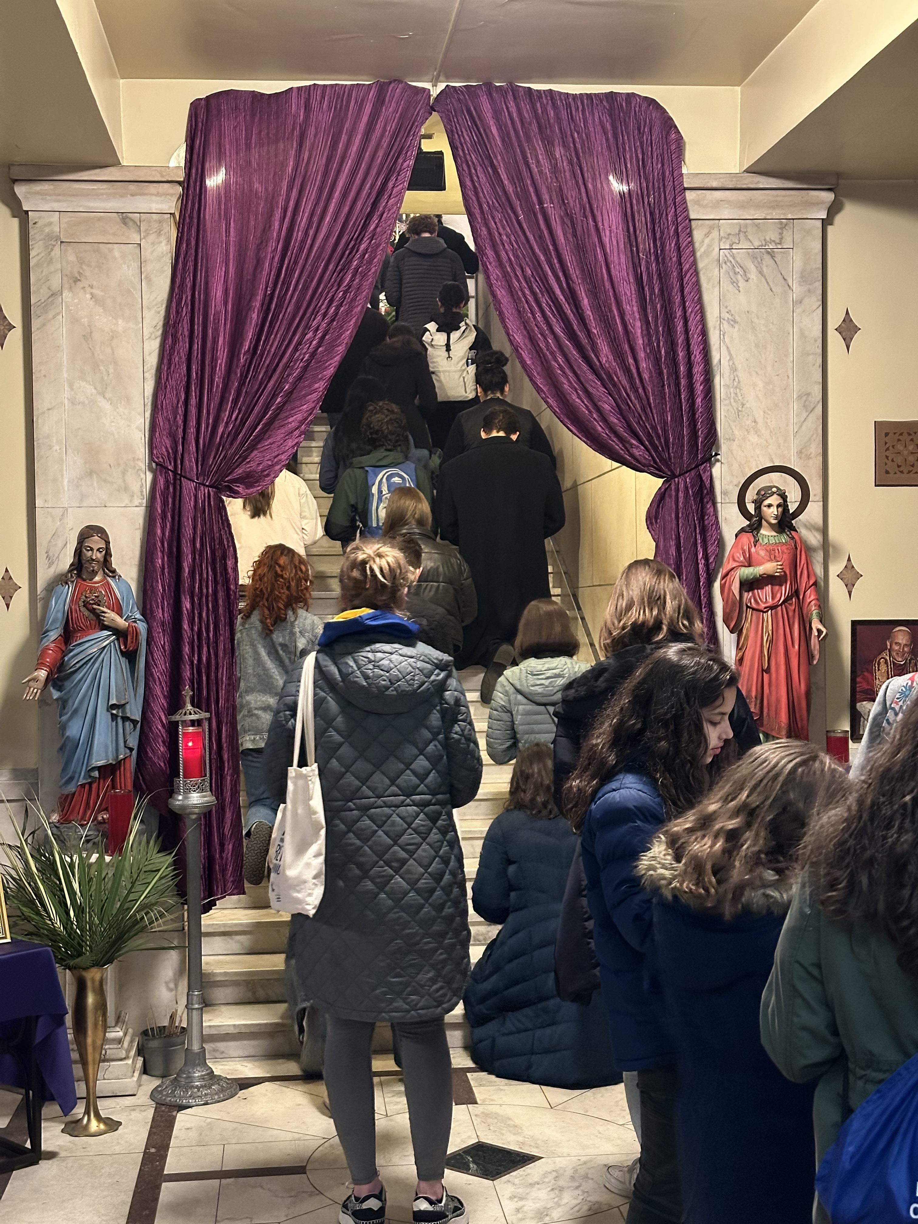 Visitors ascend the Holy Stairs replica on their knees at St. Patrick’s Church in Pittsburgh, Pennsylvania. (Photo: Courtesy of Father Nicholas Vaskov/St. Patrick Church)