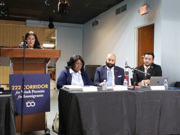 Moderator Isamac Torres-Figueroa, left; Tasha Isaac, a representative of U.S. Rep. Chrissy Houlahan's office; City Managing Director Jack Gombach; and Enrique Sanchez of the American Business Immigration Coalition, speak Wednesday at town hall at Jet Set, 118 S. Ninth St. The event marked the first stop on a nationwide bipartisan advocacy campaign promoting the Dignity Act of 2025. (MICHELLE LYNCH - READING EAGLE)