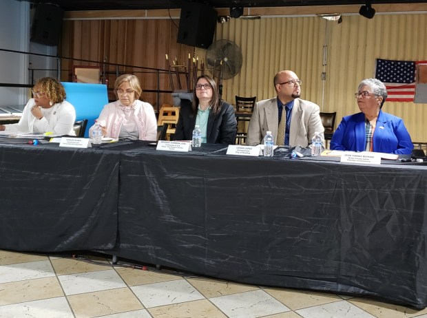 State Rep. Johanny Cepeda-Freytiz, left; business owner Sunilda Tejada; Immigration attorney Bridget Cambria, founder and executive director of ALDEA - The People's Justice Center; business owner Cesar Lopez; and Josephine Torres-Boykins, executive director at Berks County Latino Chamber of Commerce, speak Wednesday at a town hall highlighting the Dignity Act of 2025. (MICHELLE LYNCH - READING EAGLE)